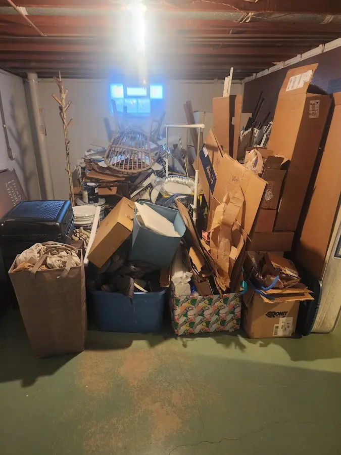 Roll-off dumpster container at job site for 15 Yard Dumpster Rental in Baytown